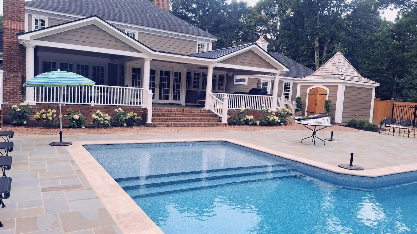 Coastal Virginia Beach home with pool and durable fencing designed for seaside environments, showing the best fence choice for coastal properties.
